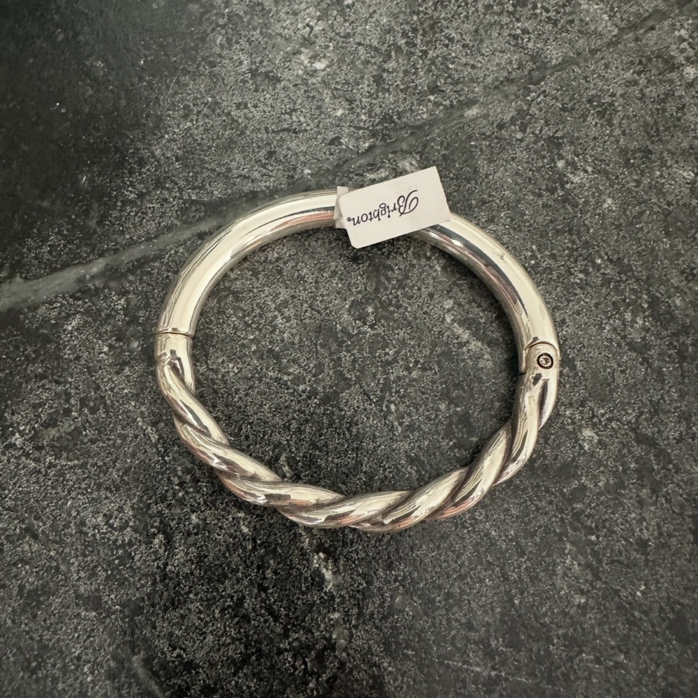 NWT Brand new, never worn Brighton Interlok Twist Hinged Bangle Bracelet.